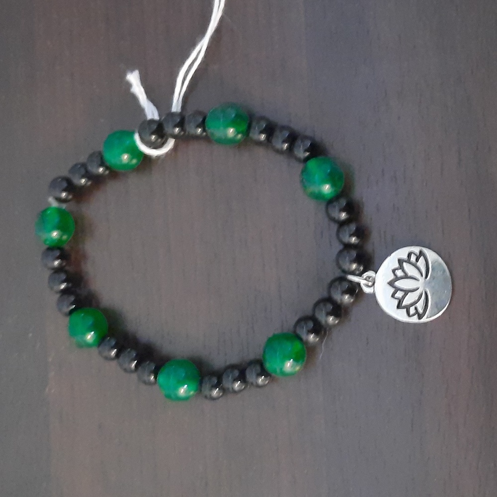 Green and black braclet with charm